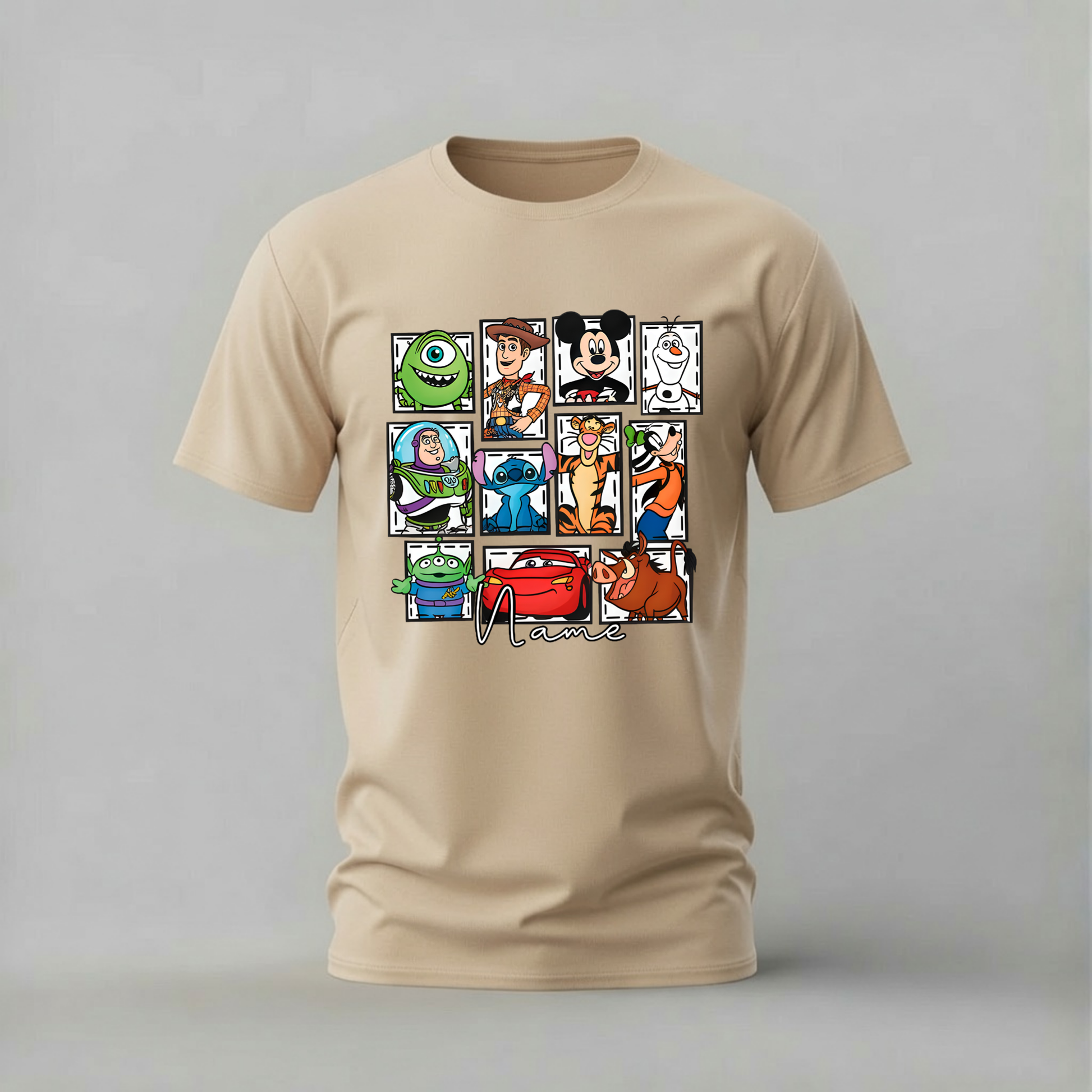 A beige crewneck t-shirt featuring a graphic collage of Disney characters including Mickey Mouse, Buzz Lightyear, Woody, Stitch, and others, with the text 'Disney' printed below the grid, shown on a neutral gray background.