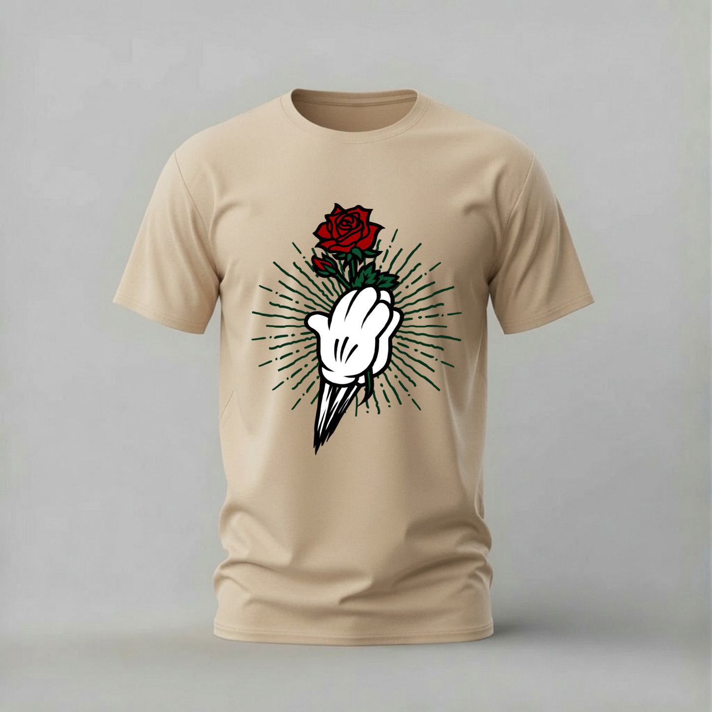 A beige short-sleeve crewneck t-shirt featuring a graphic print of a white hand holding a red rose with black and green rays radiating from it, displayed on a neutral gray background.