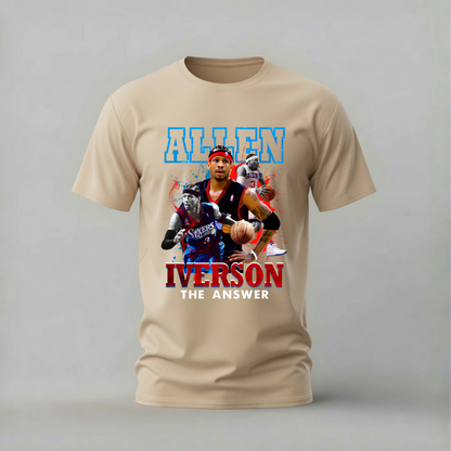 A beige short-sleeve t-shirt with a graphic print of basketball player Allen Iverson, featuring the text 'ALLEN IVerson THE ANSWER' in blue and red, displayed on a neutral gray background.