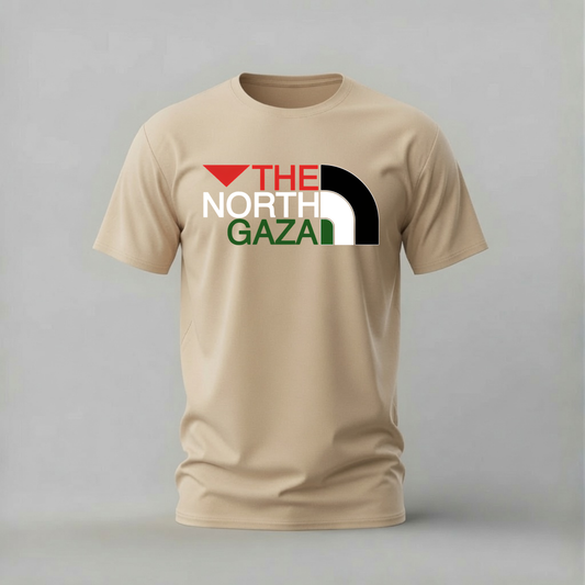A beige short-sleeve t-shirt with a graphic print on the chest reading 'THE NORTH GAZA' alongside a stylized mountain logo in red, white, and black, displayed against a neutral gray background.