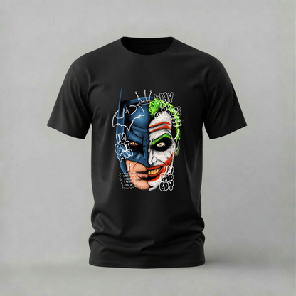 A black short-sleeve crewneck t-shirt featuring a graphic print of Batman and the Joker merged together, with 'BATMAN JOKER' text and comic-style doodles, shown against a neutral gray background.