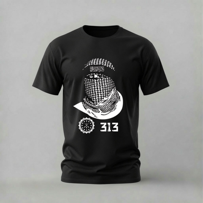 A black short-sleeve crewneck t-shirt featuring a white graphic print of a person wearing a keffiyeh patterned headscarf, with the text '313' and a circular emblem below, displayed against a neutral gray background.