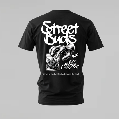 A black short-sleeve t-shirt shown from the back, featuring a large white graphic print with the text 'Street Buds', a hand holding a bag of marijuana, '420', and the phrase 'Friends in the Smoke, Partners in the Deal' on a solid gray background.