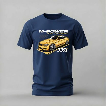 A navy blue short-sleeve t-shirt with a graphic print of a yellow sports car and the text 'M-POWER' and '335i' on a light gray background.
