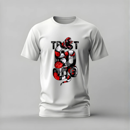A white short-sleeve crewneck t-shirt featuring a graphic print of a red and black snake wrapped around the letters 'TRUST' and 'EGO' on the front, displayed on a neutral gray background.