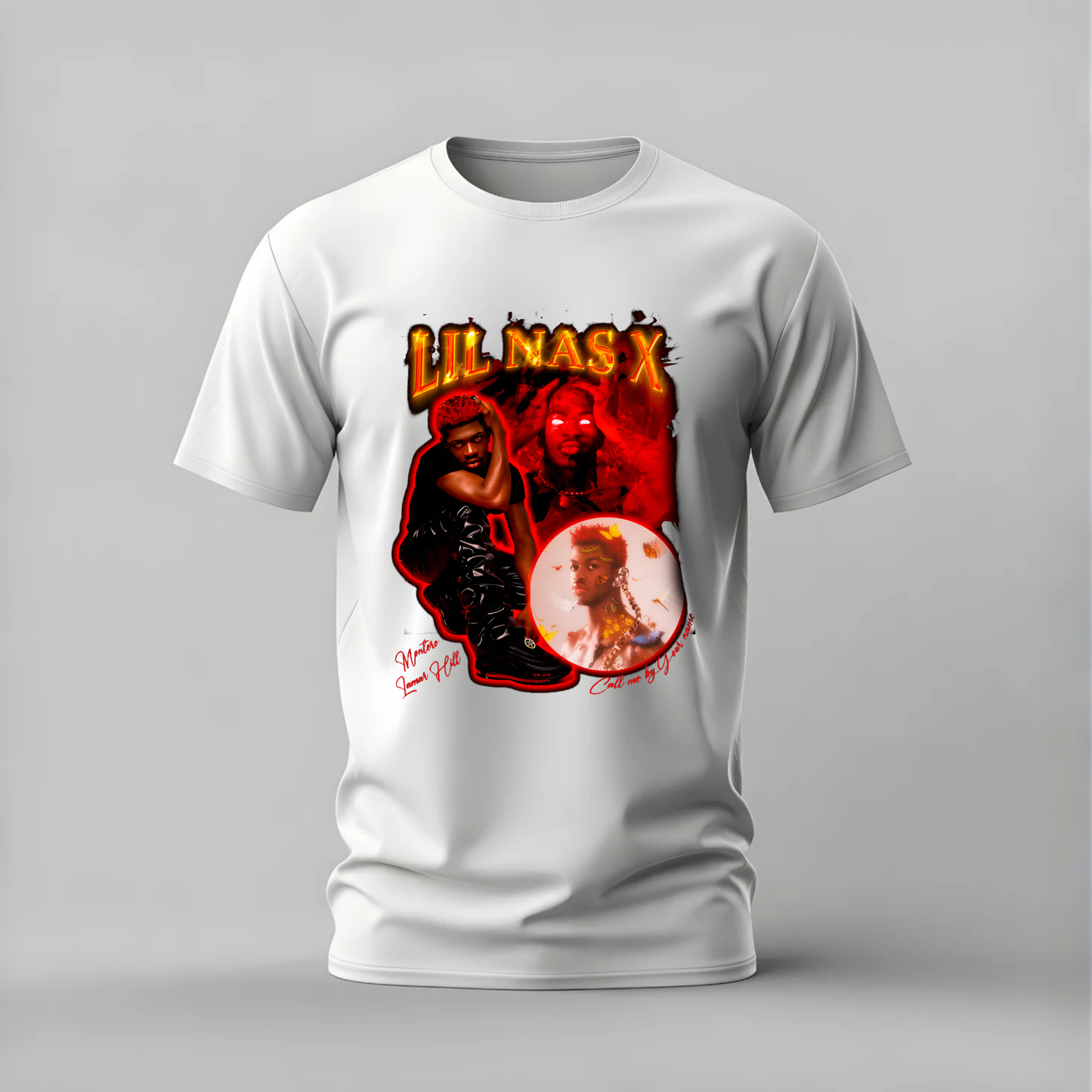 A white short-sleeve crewneck t-shirt featuring a large graphic print on the front. The graphic includes the text 'LIL NAS X' in a fiery yellow and orange font, with red and black imagery of Lil Nas X and a circular portrait, set against a neutral gray background.