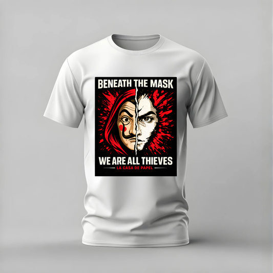 A white short-sleeve crewneck t-shirt with a graphic print on the front. The graphic features a split portrait of a face beneath a red hood, with the text 'BENEATH THE MASK WE ARE ALL THIEVES' in white lettering.