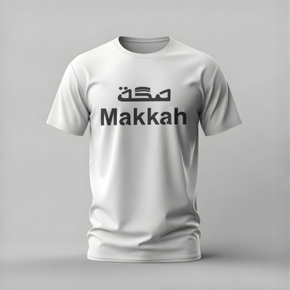White t-shirt with 'Makkah' text on a gray background