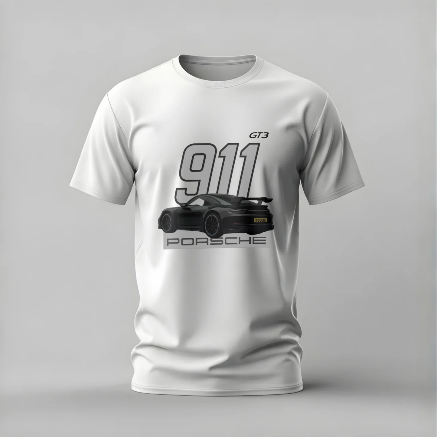 White t-shirt with Porsche 911 GT3 graphic on a gray background
