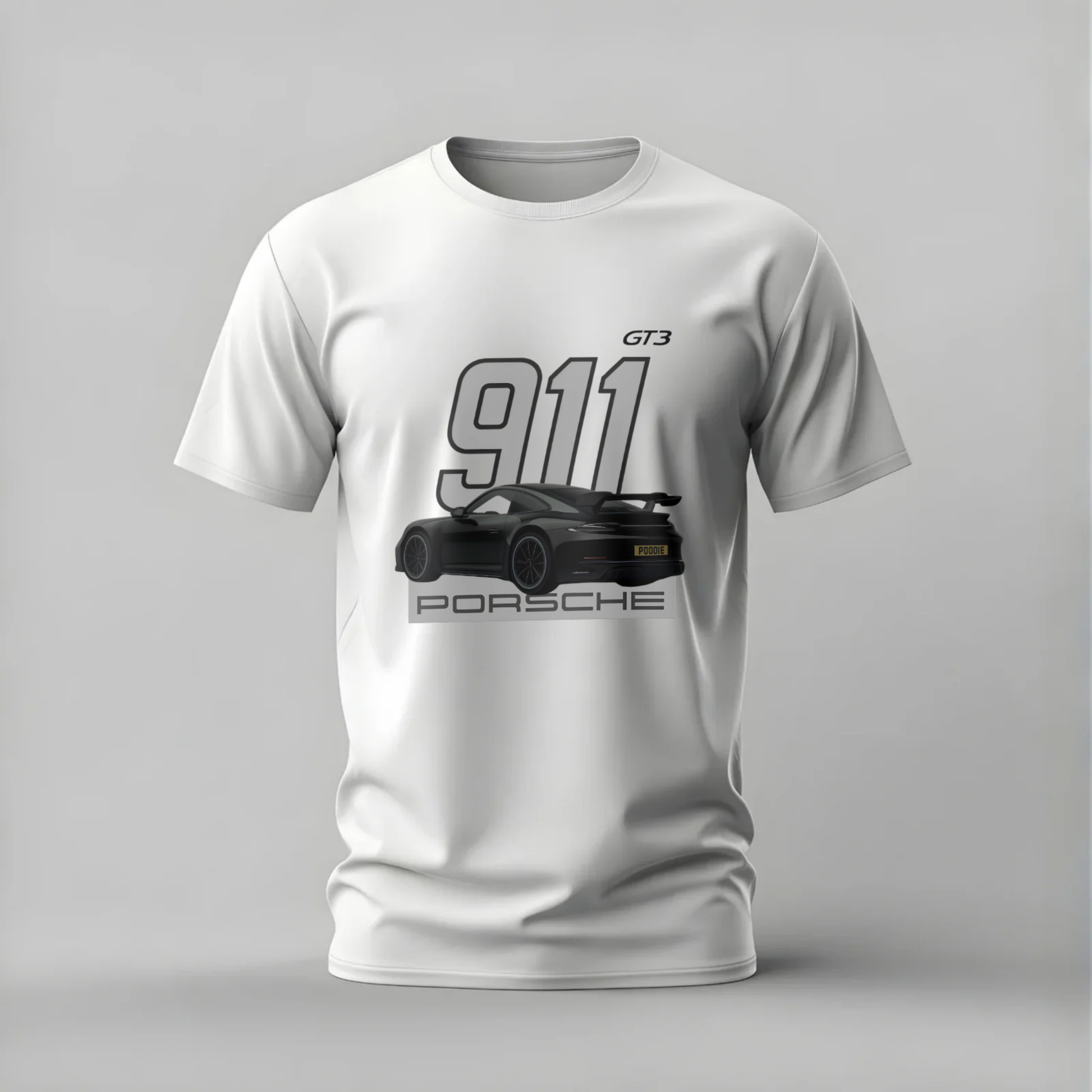 White t-shirt with Porsche 911 GT3 graphic on a gray background