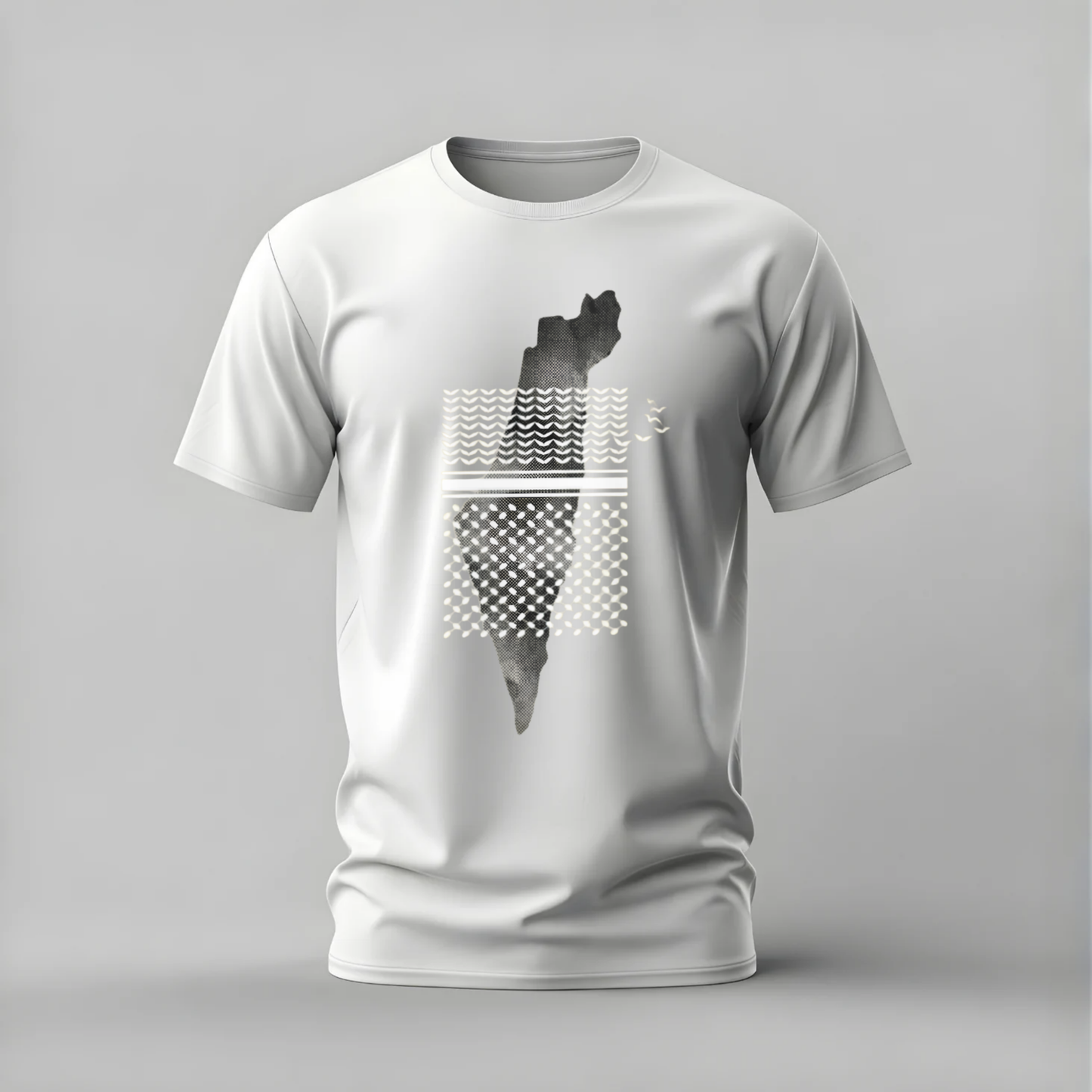 White t-shirt with black and gray graphic design on a gray background