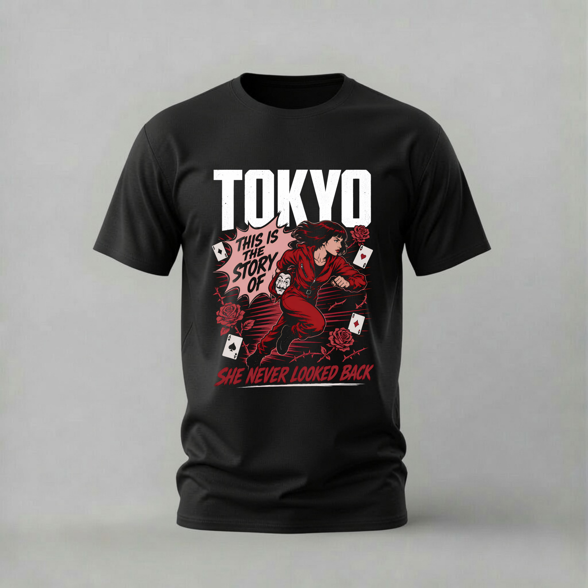 A black short-sleeve crewneck t-shirt with a graphic print on the front. The graphic features the word 'TOKYO' in bold white letters above an illustration of a woman in a red outfit surrounded by playing cards and roses, with the text 'THIS IS THE STORY OF SHE NEVER LOOKED BACK' in white and red.